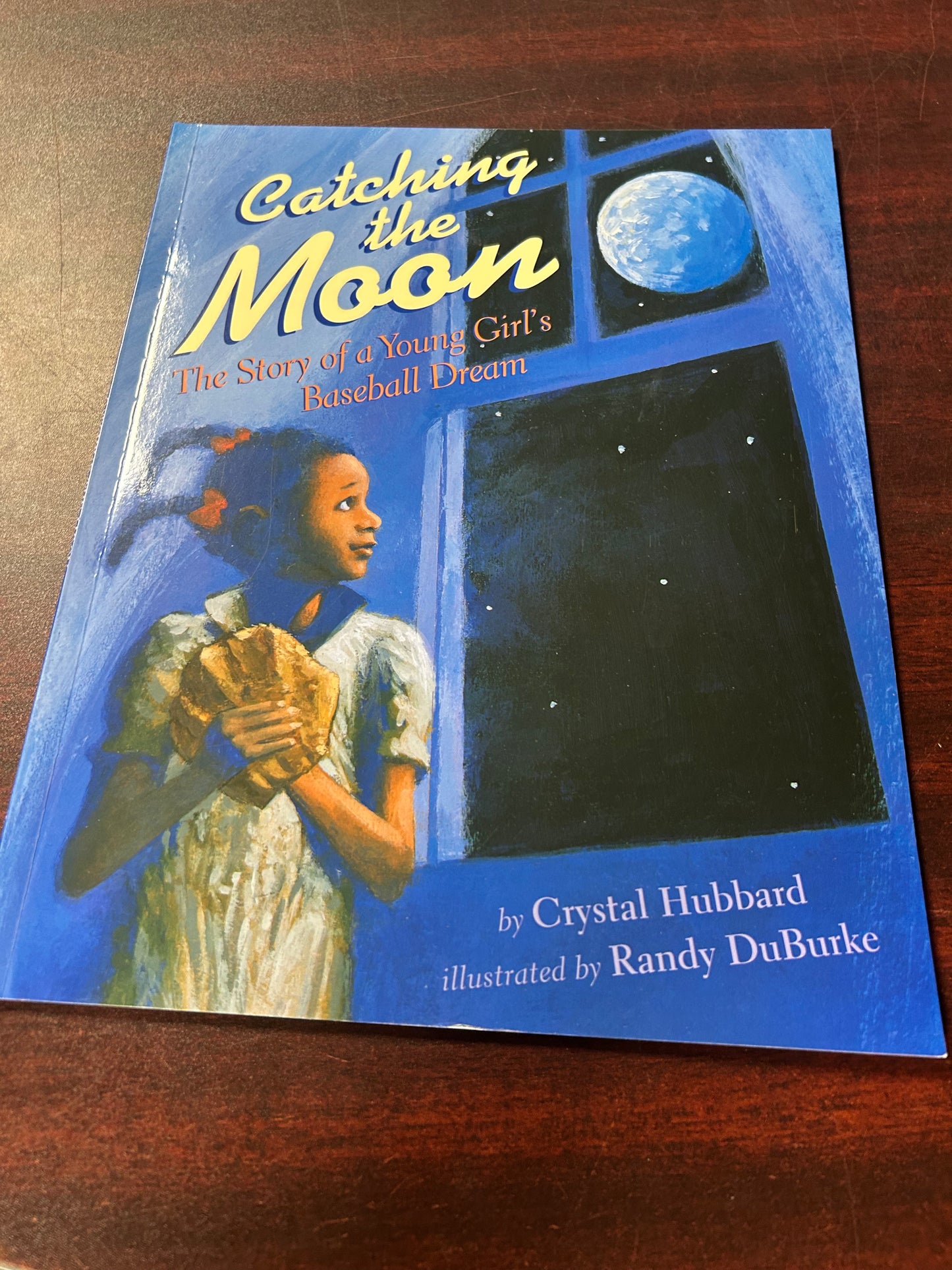 Catching the Moon: The Story of a Young Girl's Baseball Dream