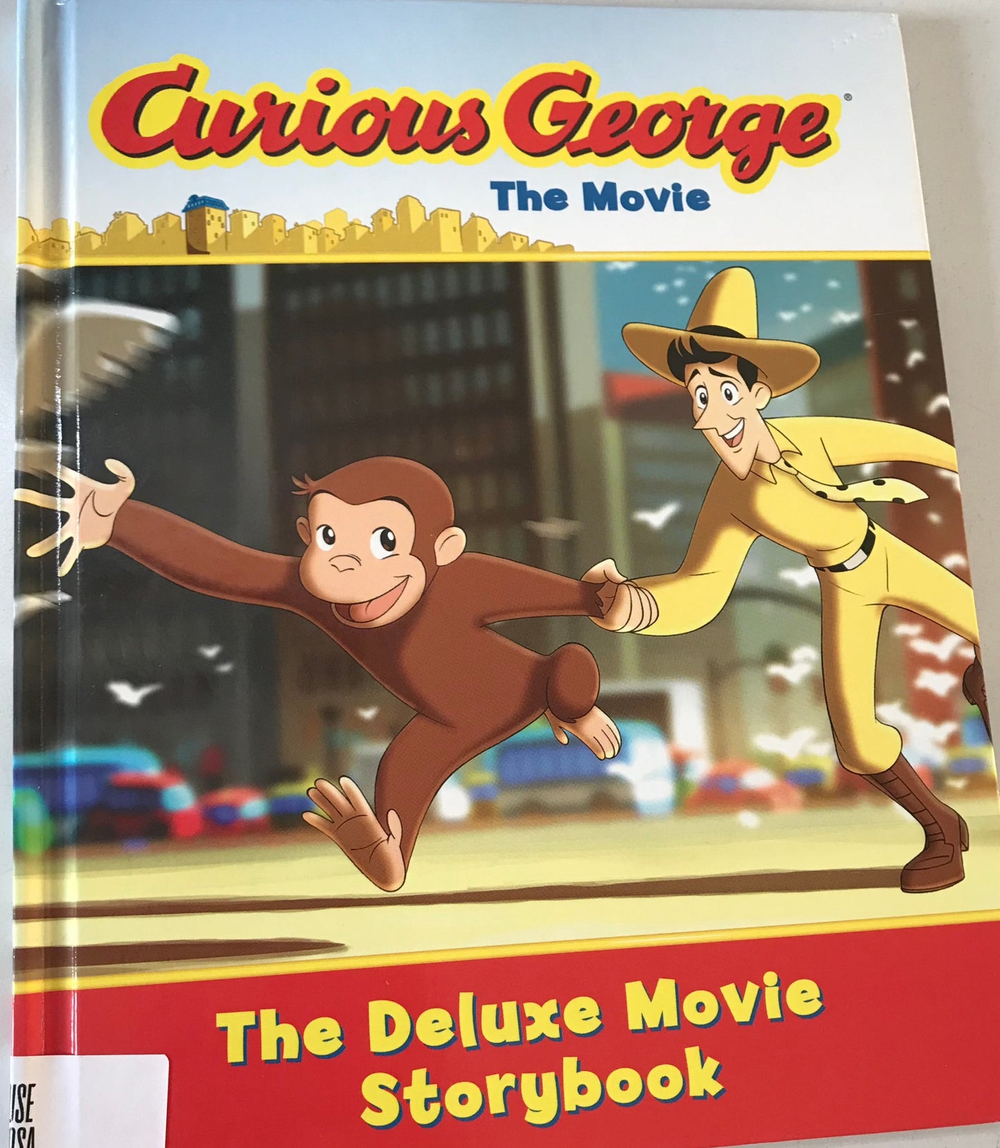 Curious George the Movie: The Deluxe Movie Storybook